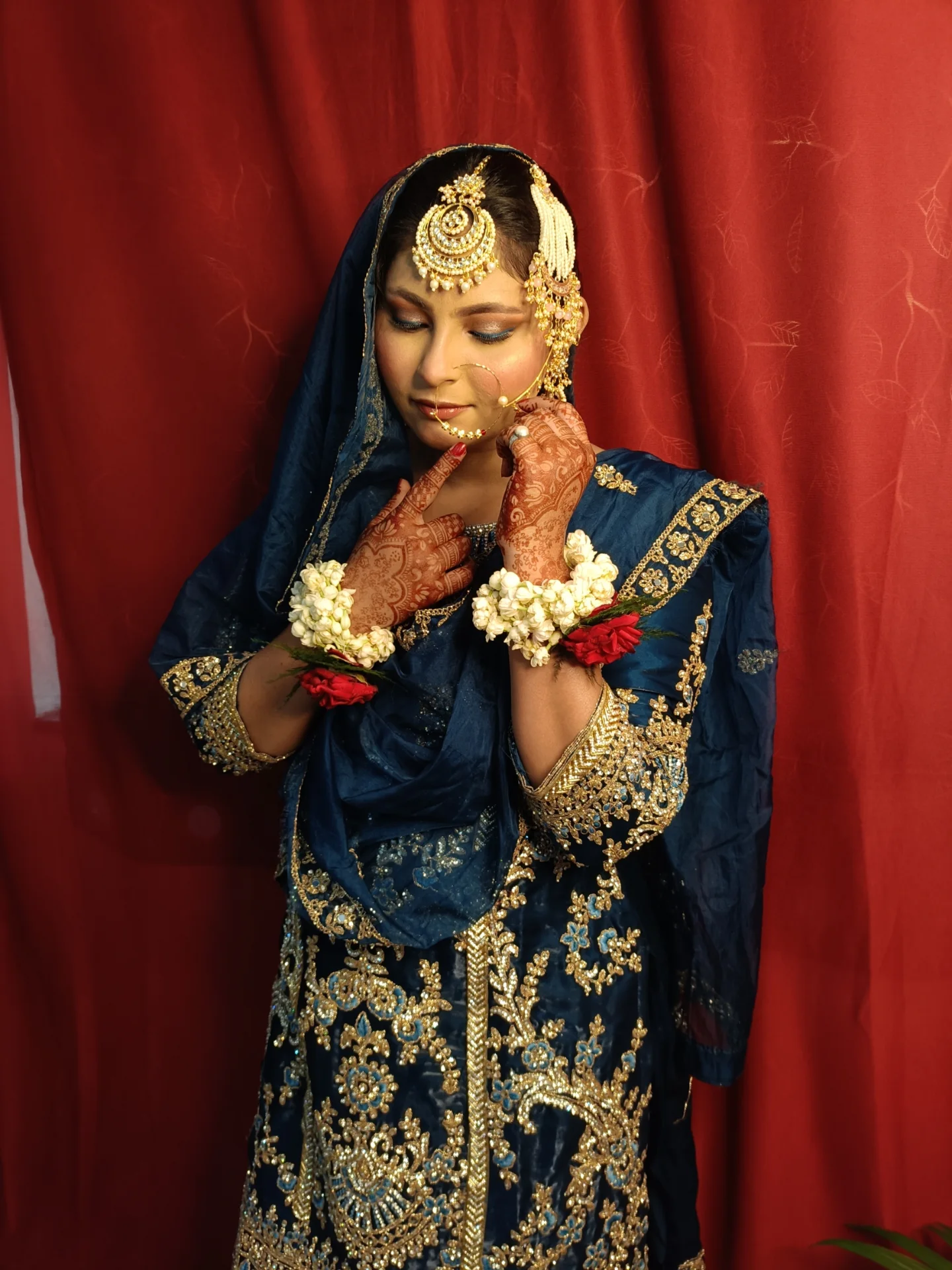Blue bridal makeup by Therounak — luxury at-home bridal makeup artist in Patna