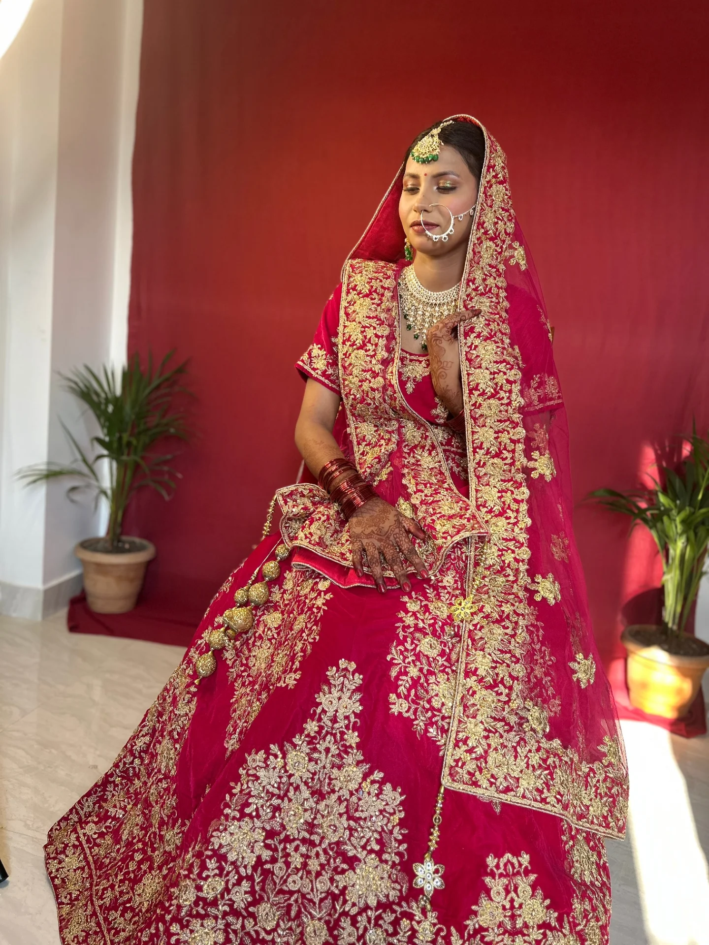 Red bridal tilted pose — Patna